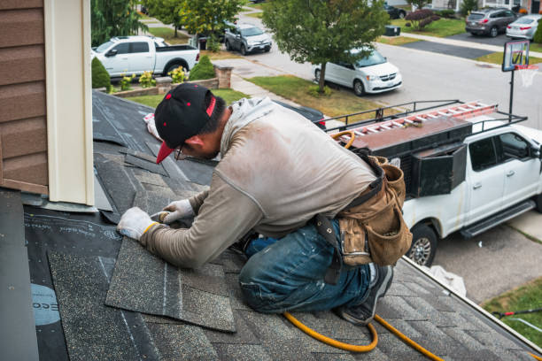Professional Storm Damage Roof Repair technician working in Wallingford, CT
